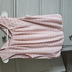 Pink blouse.
